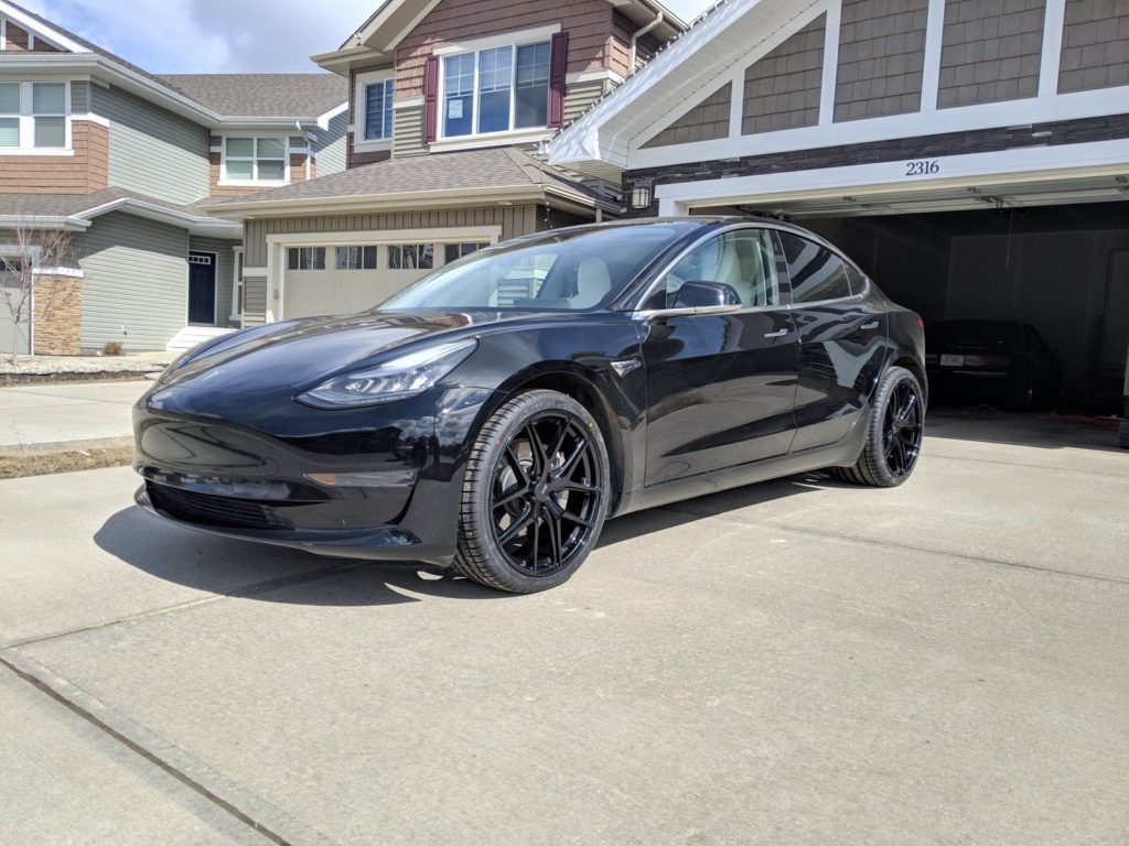 Black Model 3 with 20inch wheels, wider in rear – Tesla Model 3 Wiki