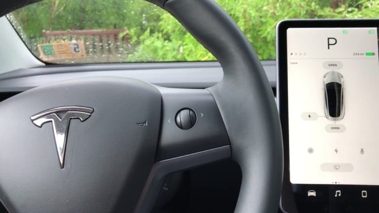 tesla model 3 windshield wipers turn on