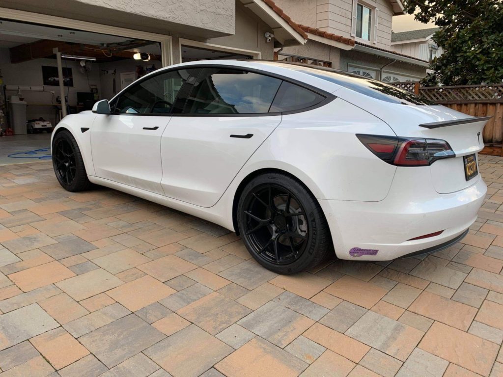 Lowering springs on Tesla model 3, 35% tinted windows, staggered wheel