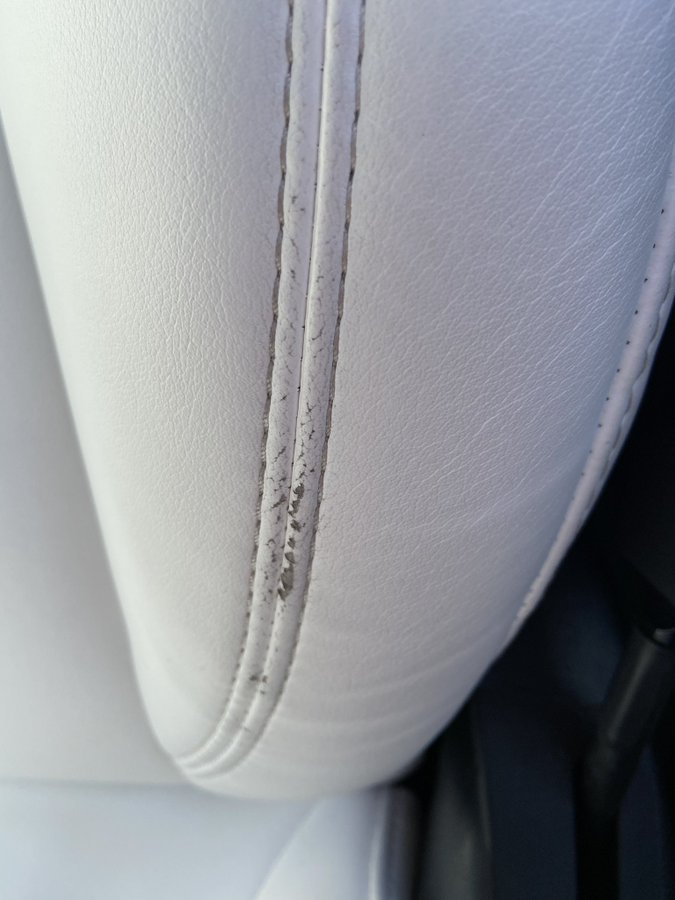 Vegan leather seats cracking after one year Tesla Model 3 Wiki