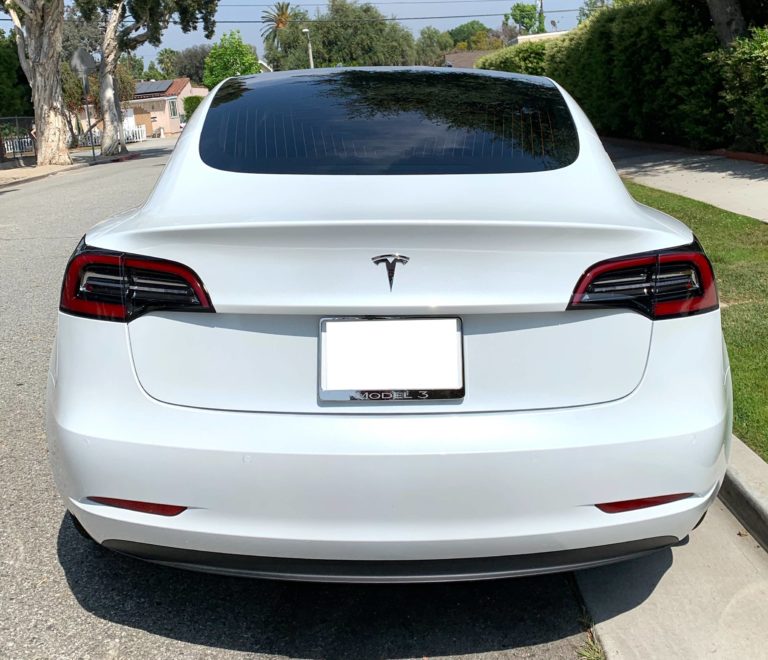 White Tesla model 3 with 30% tint on rear window – Tesla Model 3 Wiki