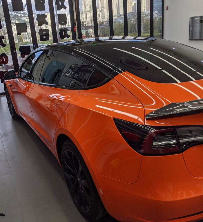 Gloss Orange Vinyl Wrapped Tesla Model 3 With Pillar Delete Tesla Model 3 Wiki 1159